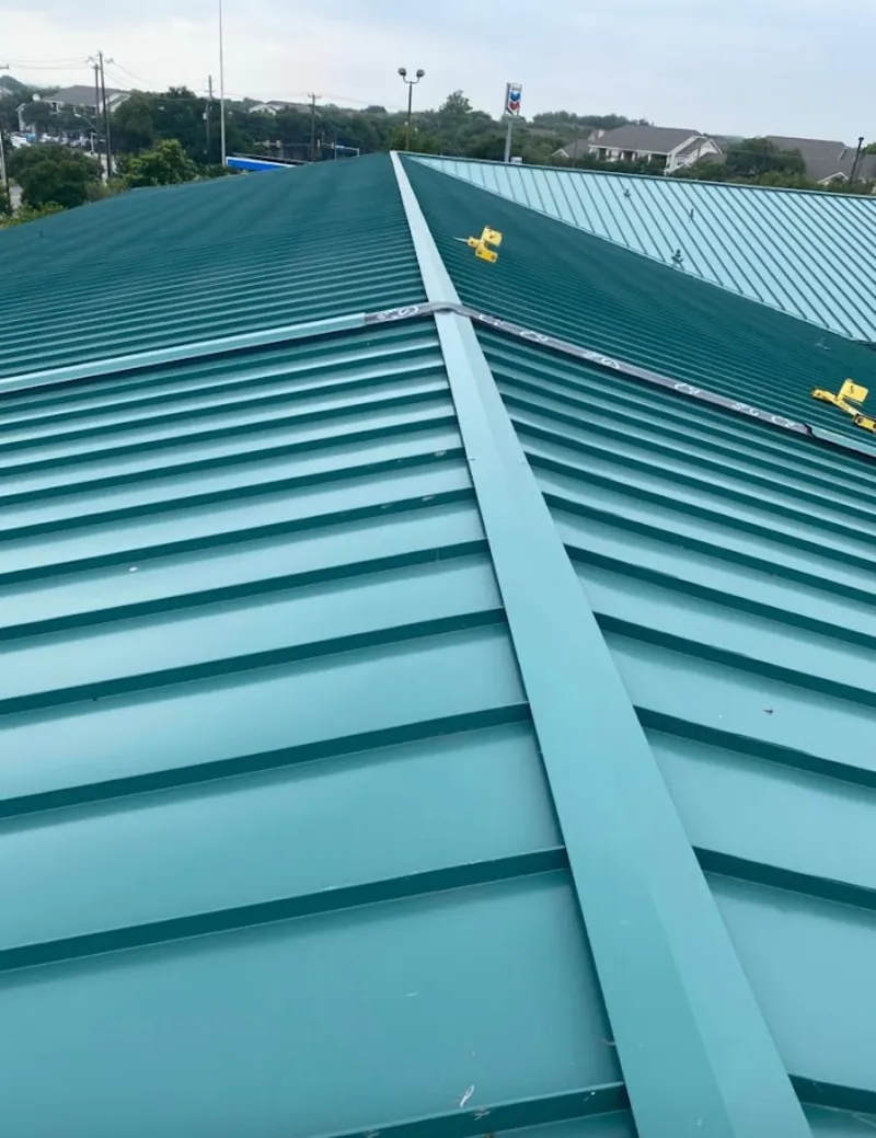 Green commercial metal roof ridge and valley for Metal Roof Repair in Wheat Ridge